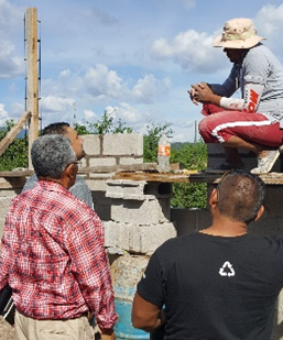 Hebron Baptist Church evangelism team witnessing to construction workers.